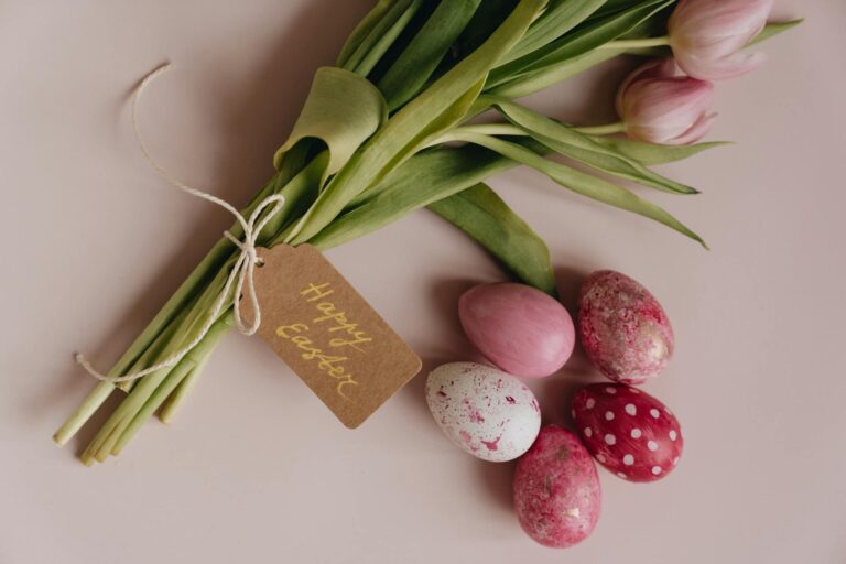 Easter flowers with colored easter eggs.