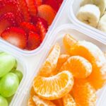 A Photo of Colorful Fruit in Containers