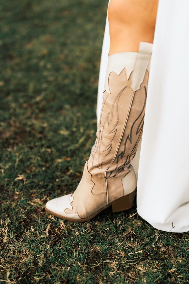 Photo of a woman's white and beige western boot