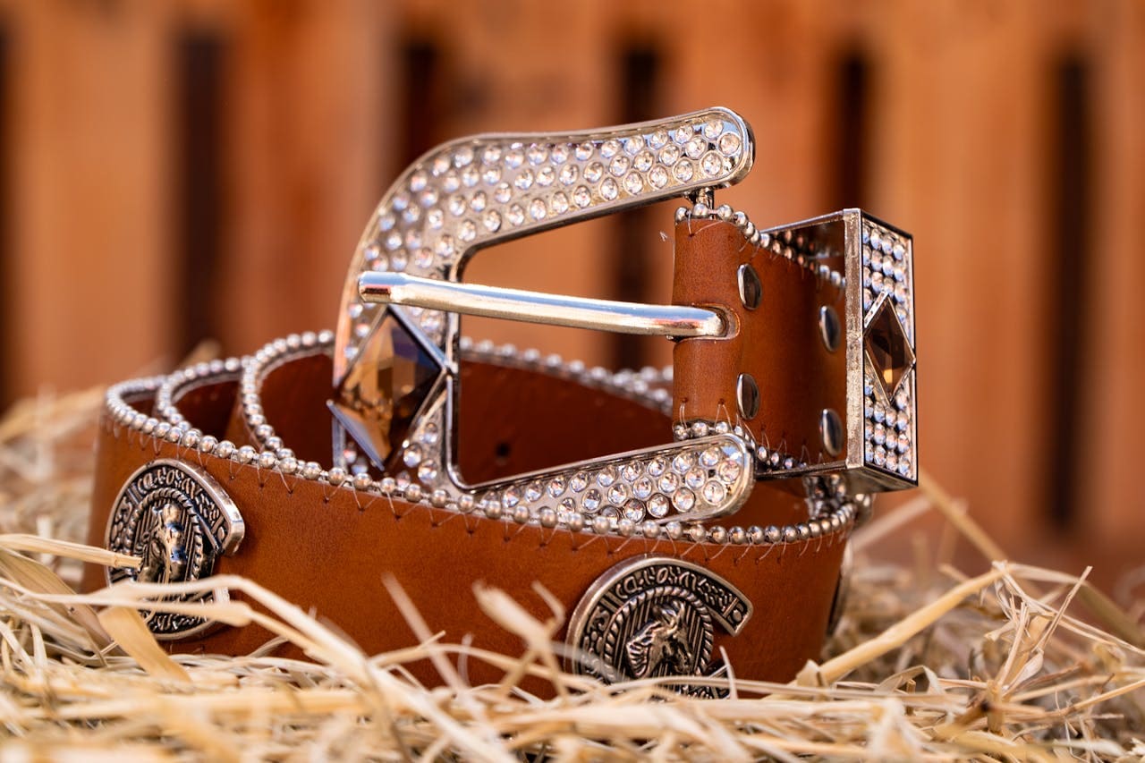 Photo of rhinestone studded woman's leather belt and belt buckle